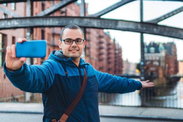 istock Man making selfie in Hamburg old town 1206165651