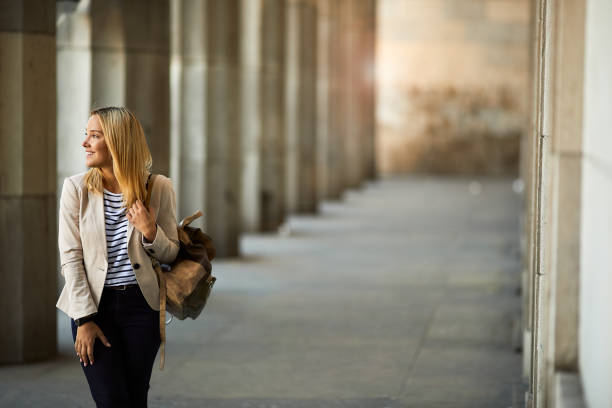 istock Collage student walking in the Buenos Aires Law University arcade facade. 1206170639
