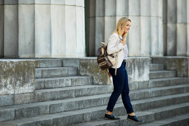 istock Collage student walking down the Buenos Aires law school steps. 1206170654