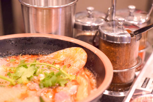 Traditional thai tom yum soup noodle with vegetables