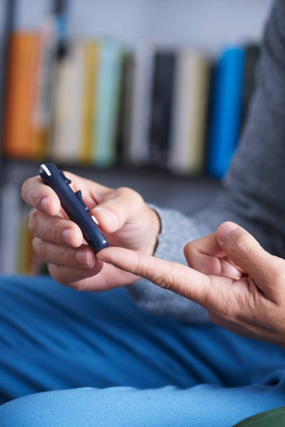 istock man about to measure his blood glucose level 1206175792