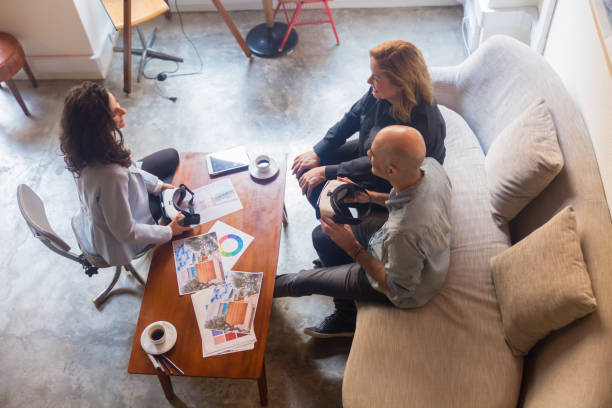 istock Top view of architect talking with clients in office 1206176163