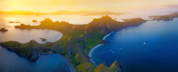 Aerial view of superlarge panorama of beautiful sunset at Padar Island, Flores Indonesia Aerial view of superlarge panorama of beautiful sunset at Padar Island, Flores Indonesia pulau komodo stock pictures, royalty-free photos & images