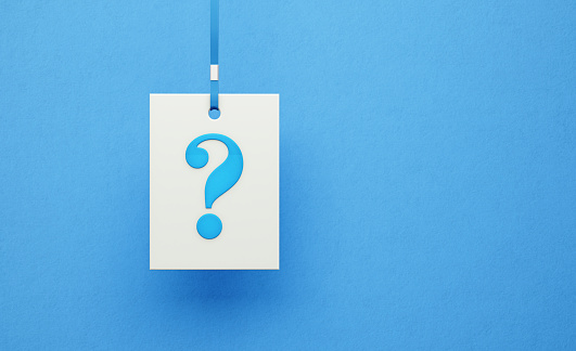 White label with question mark hanging over blue background, Horizontal composition.