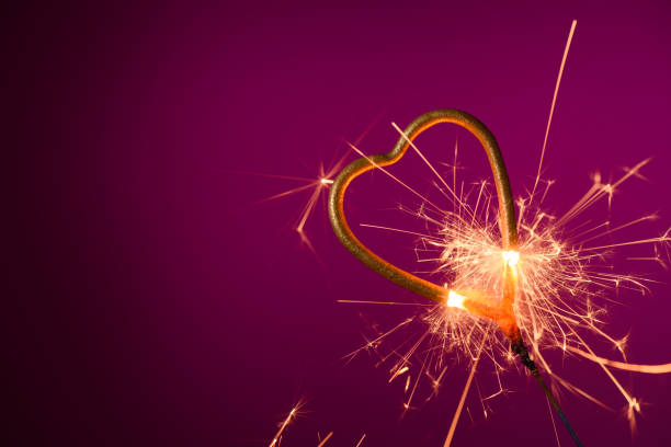 istock Sparkler love heart shape burning 1206180762