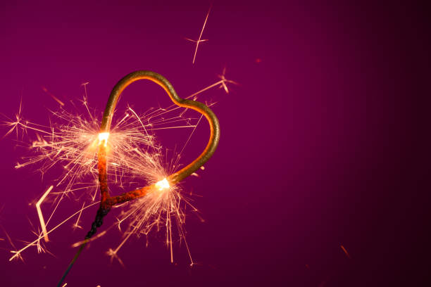istock Sparkler in shape of heart 1206181028