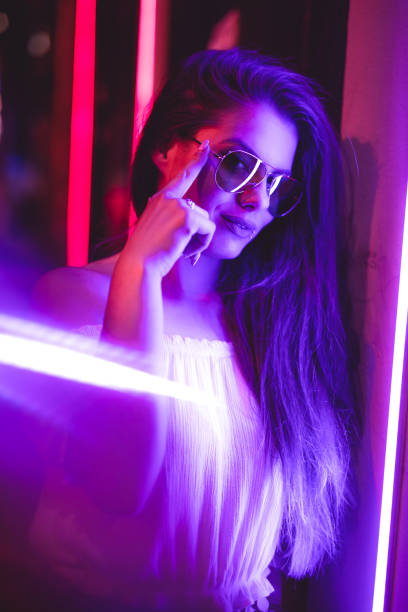 istock Woman and neon light 1206182156