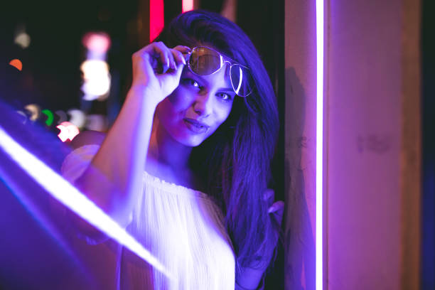 istock Woman and neon light 1206182166