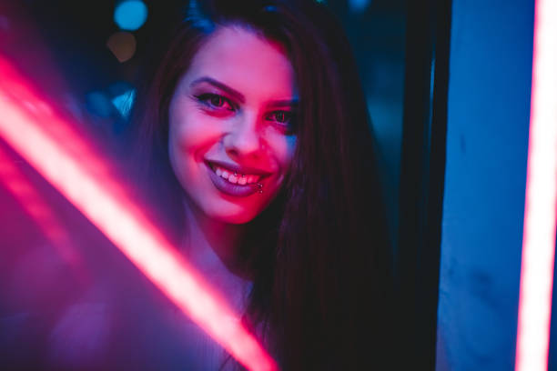 istock Woman and neon light 1206182259