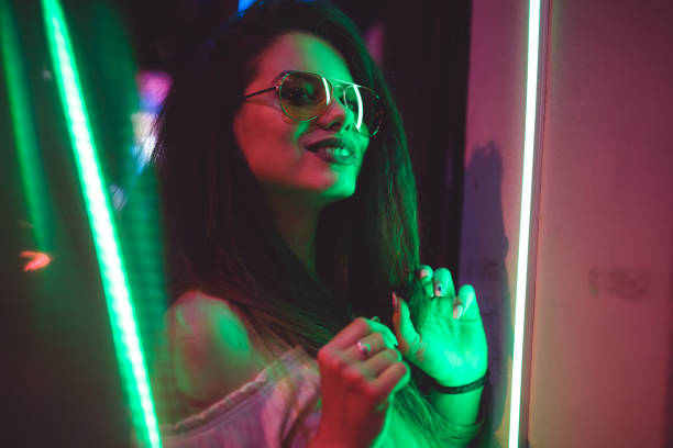 istock Woman and neon light 1206182383
