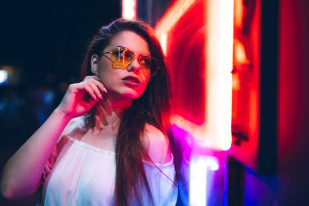 istock Woman and neon light 1206182447