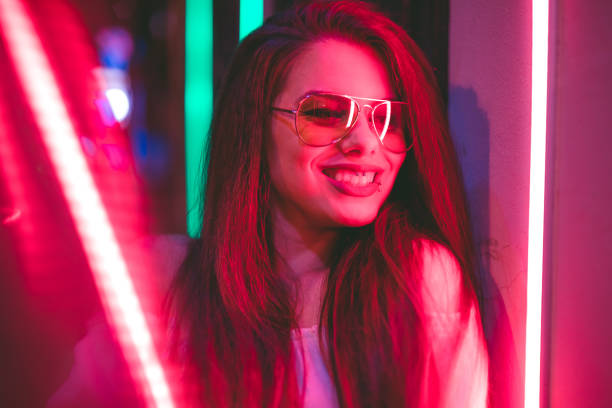 istock Woman and neon light 1206182499