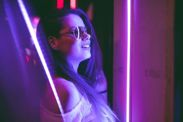 istock Woman and neon light 1206182533