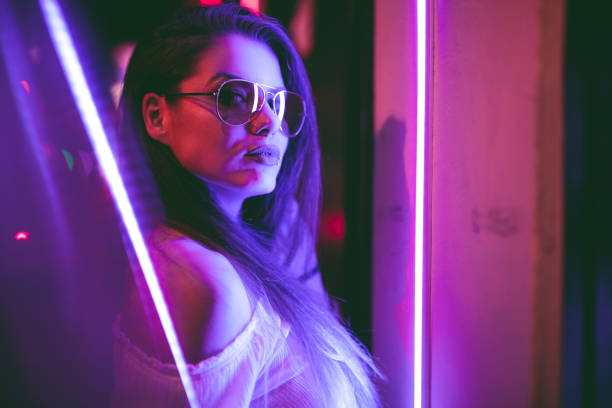 istock Woman and neon light 1206182747