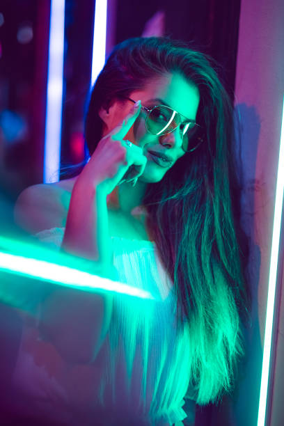 istock Woman and neon light 1206182868