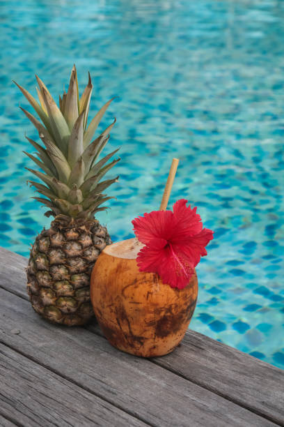 istock Coconut Pineapple Cocktail by the Pool 1206185847