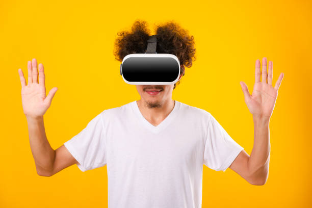 istock Asian handsome man with curly hair he using virtual reality headset or VR glass 1206187568