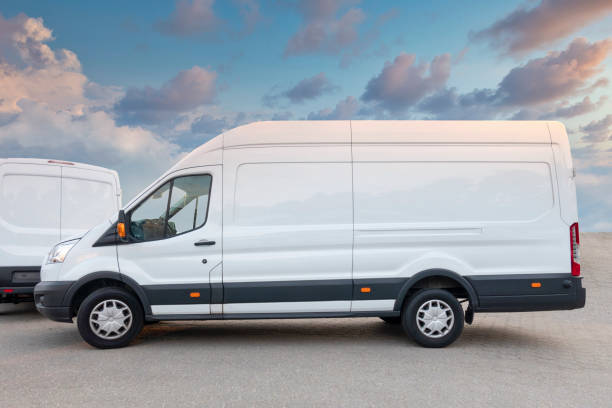 istock White vans are waiting for a new order 1206187635