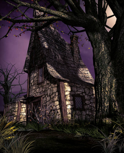 istock Old witch cottage under an even older oak tree at night 1206190109