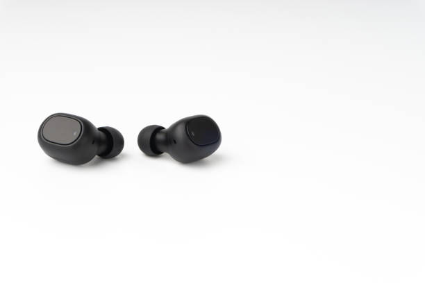 istock Wireless earbuds or earphones on white background 1206195795