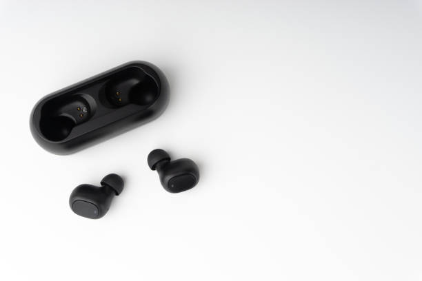 istock Wireless earbuds or earphones on white background 1206195812