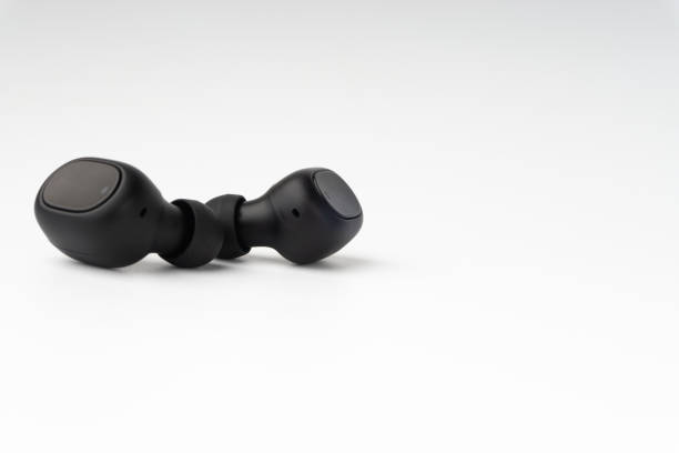 istock Wireless earbuds or earphones on white background 1206195886