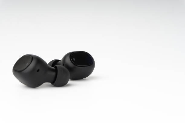 istock Wireless earbuds or earphones on white background 1206195894