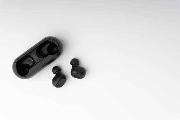 istock Wireless earbuds or earphones on white background 1206195905