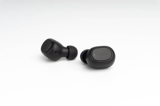 istock Wireless earbuds or earphones on white background 1206195953