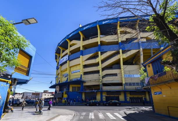 La Bombonera - famous football stadium in Buenos Aires Buenos Aires, Argentina, October 31, 2019: View of the famous football stadium La Bombonera (Chocolate box) of famous Argentinian club Boca Juniors. Diego Maradona played here. Official name of La Bombonera is Estadio Alberto J. Armando. city street street corner tree stock pictures, royalty-free photos & images