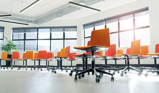 Shot of chairs in an an empty modern office