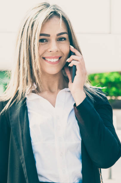 istock Joyful happy business lady calling on cell 1206201750