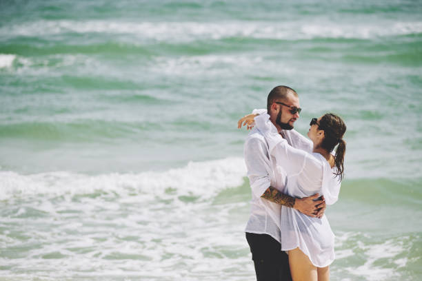 istock Kising couple on beach 1206204868