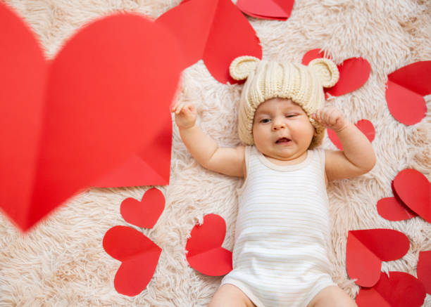 istock baby photoshoot with hearts 1206205018