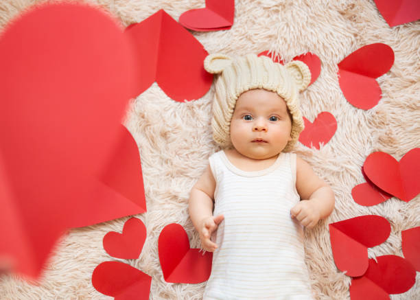 istock baby photoshoot with hearts 1206205193