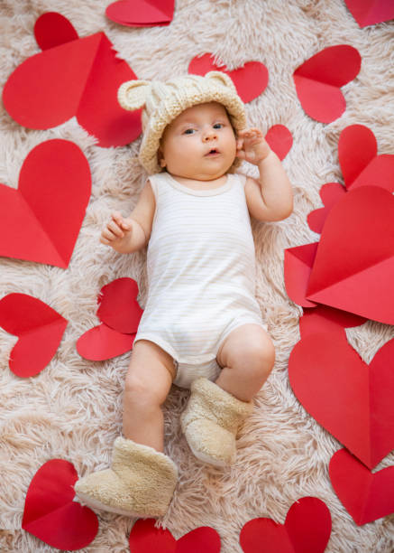 istock baby photoshoot with hearts 1206205361