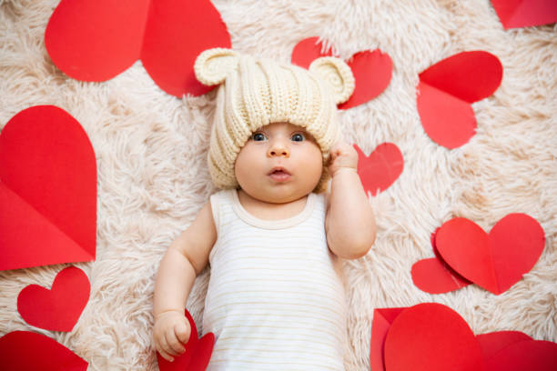 istock baby photoshoot with hearts 1206206453