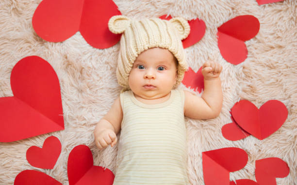 istock baby photoshoot with hearts 1206207050