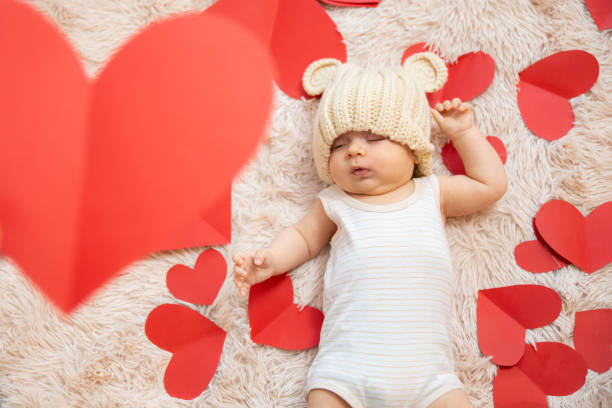 istock baby photoshoot with hearts 1206207842