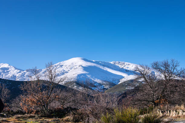 istock view of a snowy mountain in sunny day 1206207994
