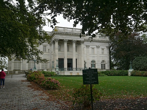 Newport, Rhode Island-September 2017: Front lawn and facade of the Marble Mansion, one of the most popular mansions in Newport.