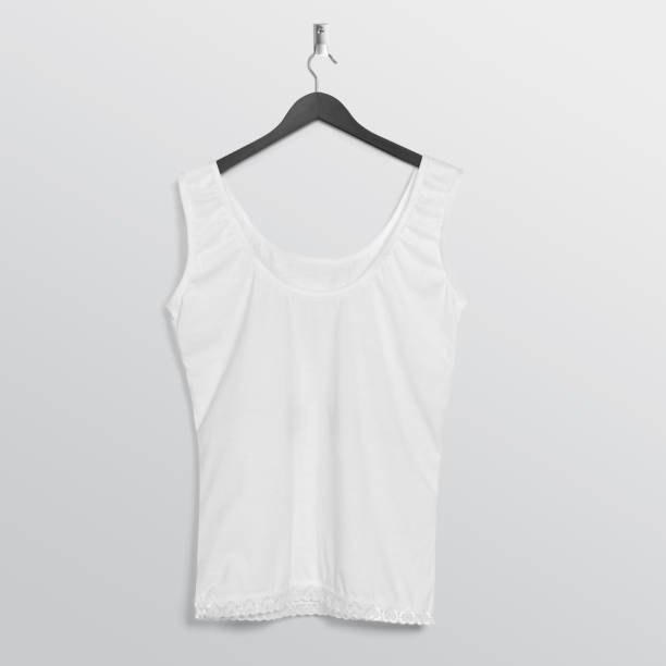istock Plain white sleeveless shirt hanging on wall 1206211062