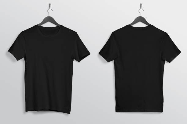 Plain black t shirt hanging on wall Front and rear view of black plain round neck t shirt hanging on wall on isolated background round neckline stock pictures, royalty-free photos & images