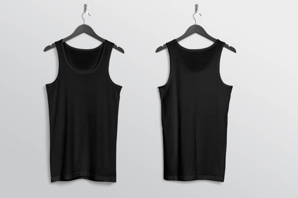 Plain black tank top shirt hanging on wall