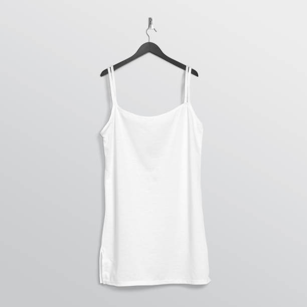 istock Plain white camisole shirt hanging on wall 1206211671