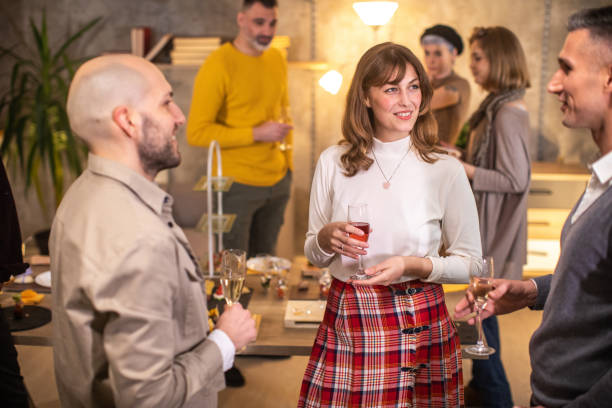 istock Business colleagues enjoying conversation at after work dinner party 1206211765