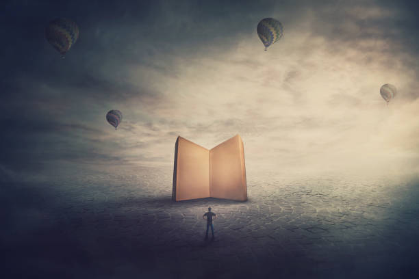 istock Surreal scene, imaginary world, tiny man stands in front of a giant opened book with empty blank pages. Education concept, the magic and fantasy of a story teller. Knowledge and wisdom symbol. 1206212613