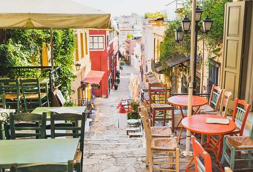 Charming street with cafe tables, Plaka district, Athens, Greece