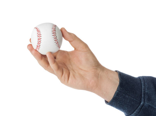 istock Hand and baseball ball 1206223756
