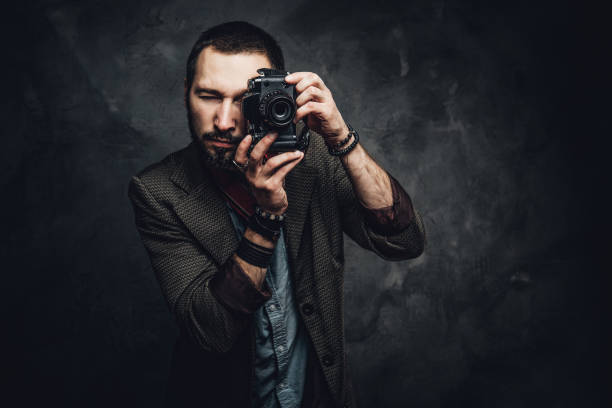 istock Reporter is taking a photo at photo studio 1206223840